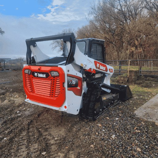 Compact track loader used by J & K Excavating for dirt work